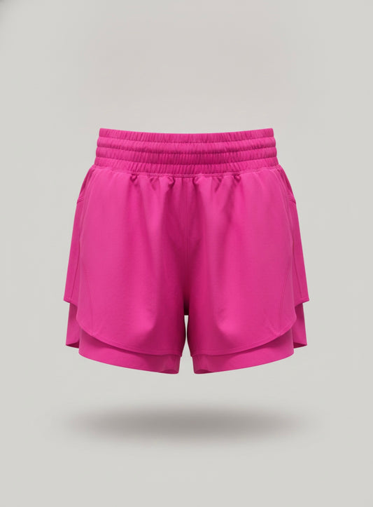 Lululemon Shake It Out high‑rise shorts shown from the front, featuring sleek reflective side panels, supportive waistband and fitted athletic cut